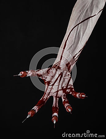 Bloody hand with syringe on the fingers, toes syringes, hand syringes, horrible bloody hand, halloween theme, zombie doctor, black