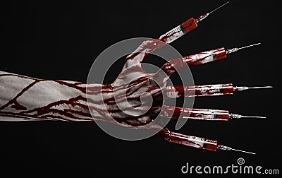 Bloody hand with syringe on the fingers, toes syringes, hand syringes, horrible bloody hand, halloween theme, zombie doctor, black