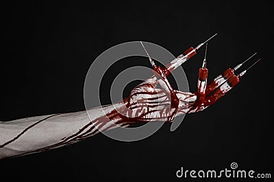 Bloody hand with syringe on the fingers, toes syringes, hand syringes, horrible bloody hand, halloween theme, zombie doctor, black