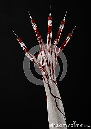 Bloody hand with syringe on the fingers, toes syringes, hand syringes, horrible bloody hand, halloween theme, zombie doctor, black