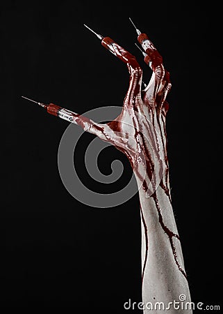 Bloody hand with syringe on the fingers, toes syringes, hand syringes, horrible bloody hand, halloween theme, zombie doctor, black