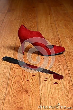 Bloody knife with high heel shoe