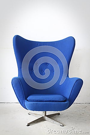 Blue chair in the room