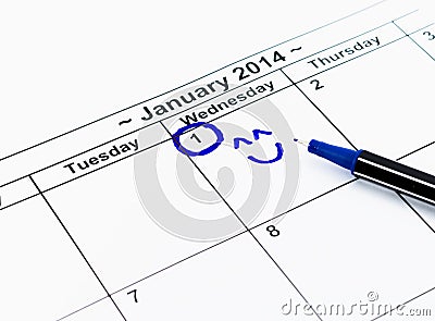 Blue circle with smile. Mark on the calendar at 1St January 2014