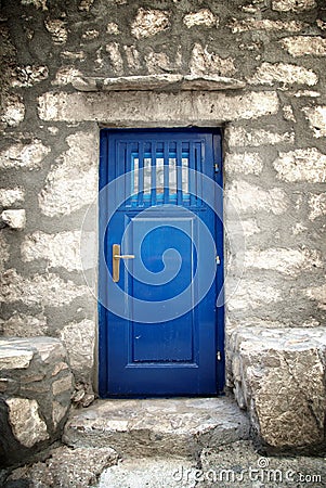 Blue door in old stone house