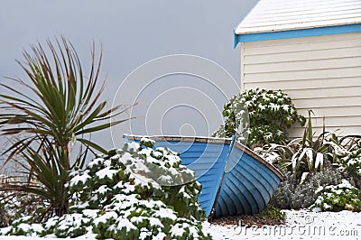 Blue fisherman boat in winter