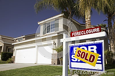 Real Estate Foreclosures on Blue Foreclosure For Sale Real Estate Sign And Hou Stock Photography