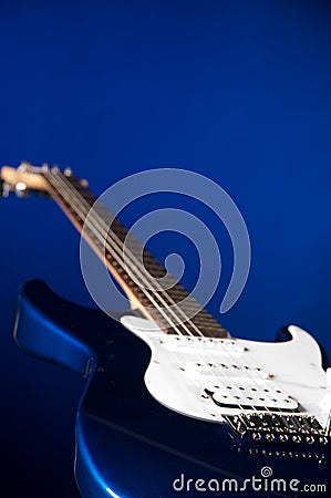 Blue Guitar Isolated On Blue