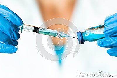 A Blue Medical Fluid Sucked into the Injection