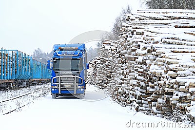 Blue Scania R580 V8 Logging Truck at Railway Timber Yard