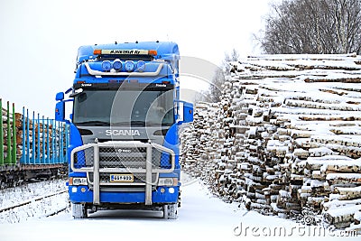 Blue Scania R580 V8 Logging Truck at Railway Timber Yard