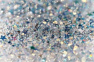 Blue and Silver Frozen Snow Winter Sparkling Stars Glitter background. Holiday, Christmas, New Year abstract texture