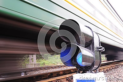 Blue train signal, motion blur