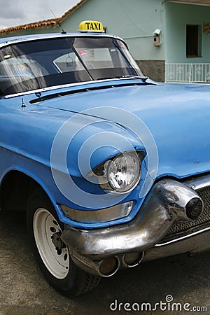 Blue vintage taxi cab in Havana, Cuba