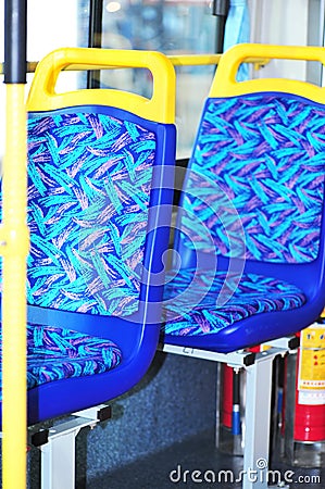 Blue and yellow bus seats