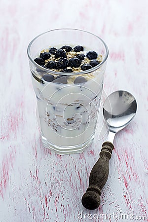 Blueberries muesli with spoon