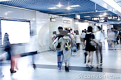 Blur passenger walk at subway station