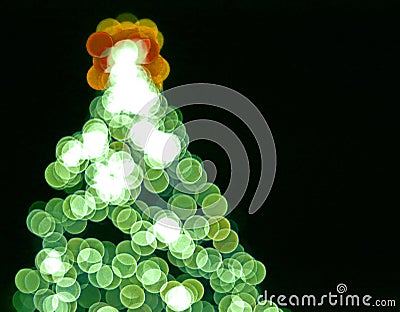 Blurred lights in form of Christmas tree