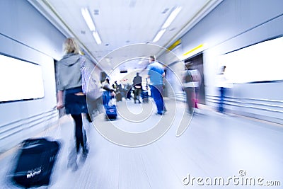 Blurred people on airport