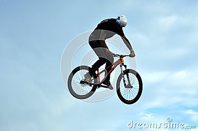 BMX rider making a bike jump
