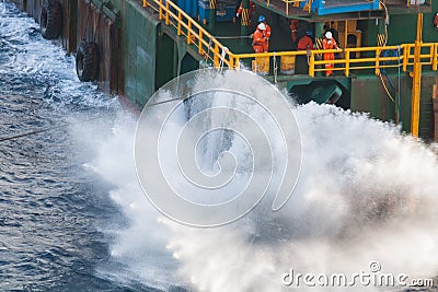 Boatman working on deck supply boat, crews operation on installation boat