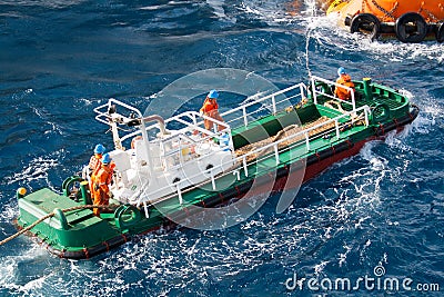 Boatman working on deck supply boat, crews operation on installation boat