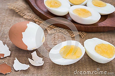 Boiled eggs and wooden plate