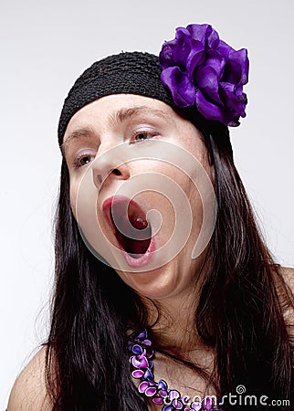 Bored Young Woman Yawning with Open Mouth