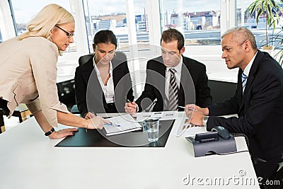 Boss instructing business team