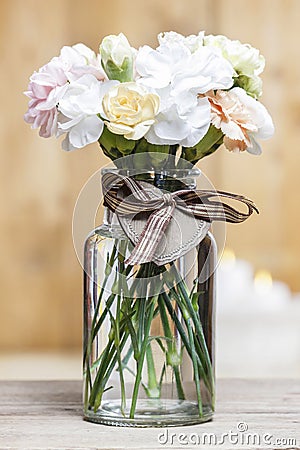 Bouquet of carnation flowers in glass vase