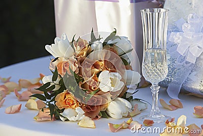 Bouquet With Champagne Flute and Gifts