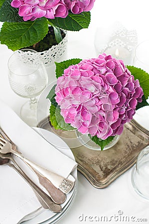 Pink hydrangeas and vintage cutlery