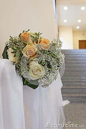 A bouquet of yellow and white roses