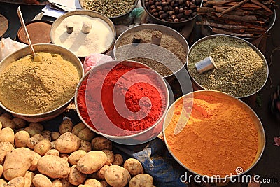 Bowls of cooking spices in Indian market