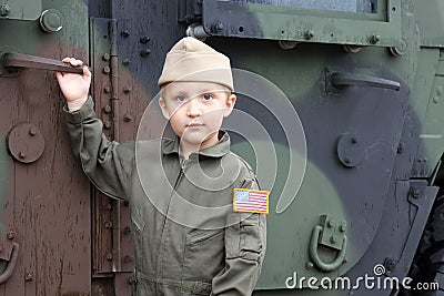 Boy in American army uniform
