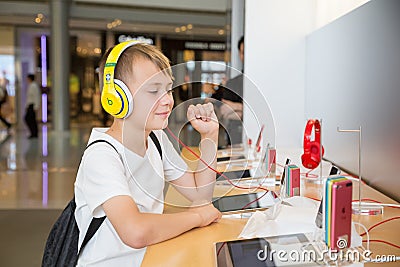 Boy in Apple store in Hong Kong