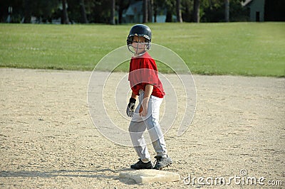 Boy on base in baseball game