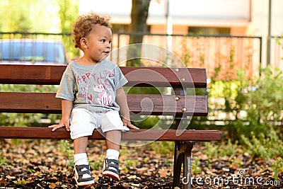 Boy On Bench Waiting Royalty Free Stock Pho