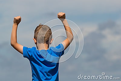 Boy with clenched fists