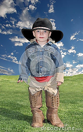 Boy in Cowboy Hat and Boots