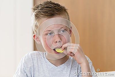 Boy eating candy