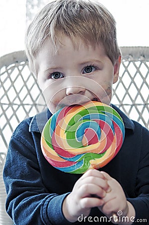 Boy eating candy