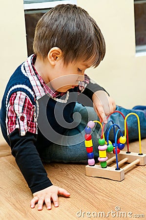 Boy with educational toy