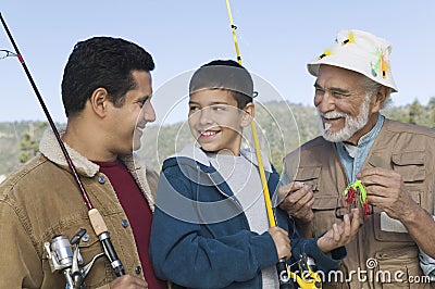 Boy Fishing With Father And Grandfather