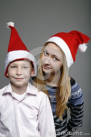 Boy and girl in caps