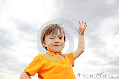 Boy making wake-up call with smile