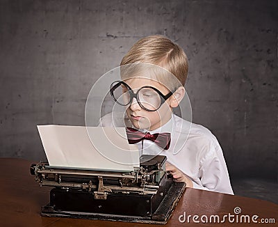 Boy with the old typewriter