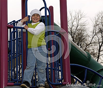 Boy at park with white sock hat