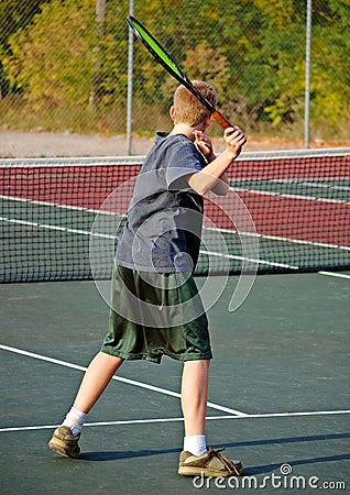 Boy Playing Tennis - Forehand