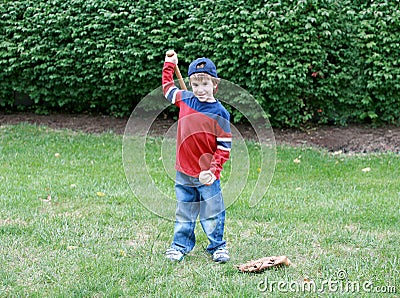 Boy Practicing Baseball
